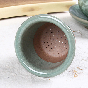 Round Celadon Arabesque Tea Cup with Saucer