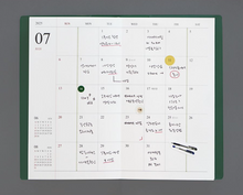 Load image into Gallery viewer, 2025 Official Slim Dated Monthly Planner